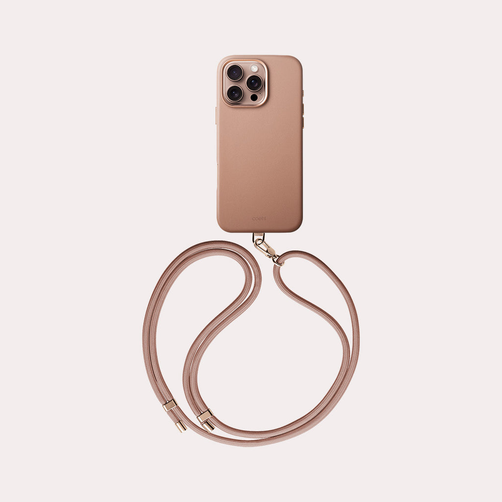 MUSE, the leatherette iPhone 16 Pro case comes with a phone strap and available in dusty nude color.